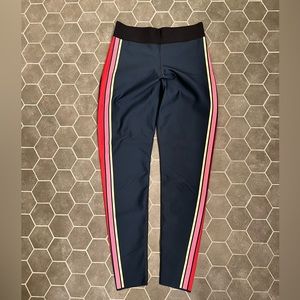 Like new Ultracor leggings with athletic stripe. In great condition.